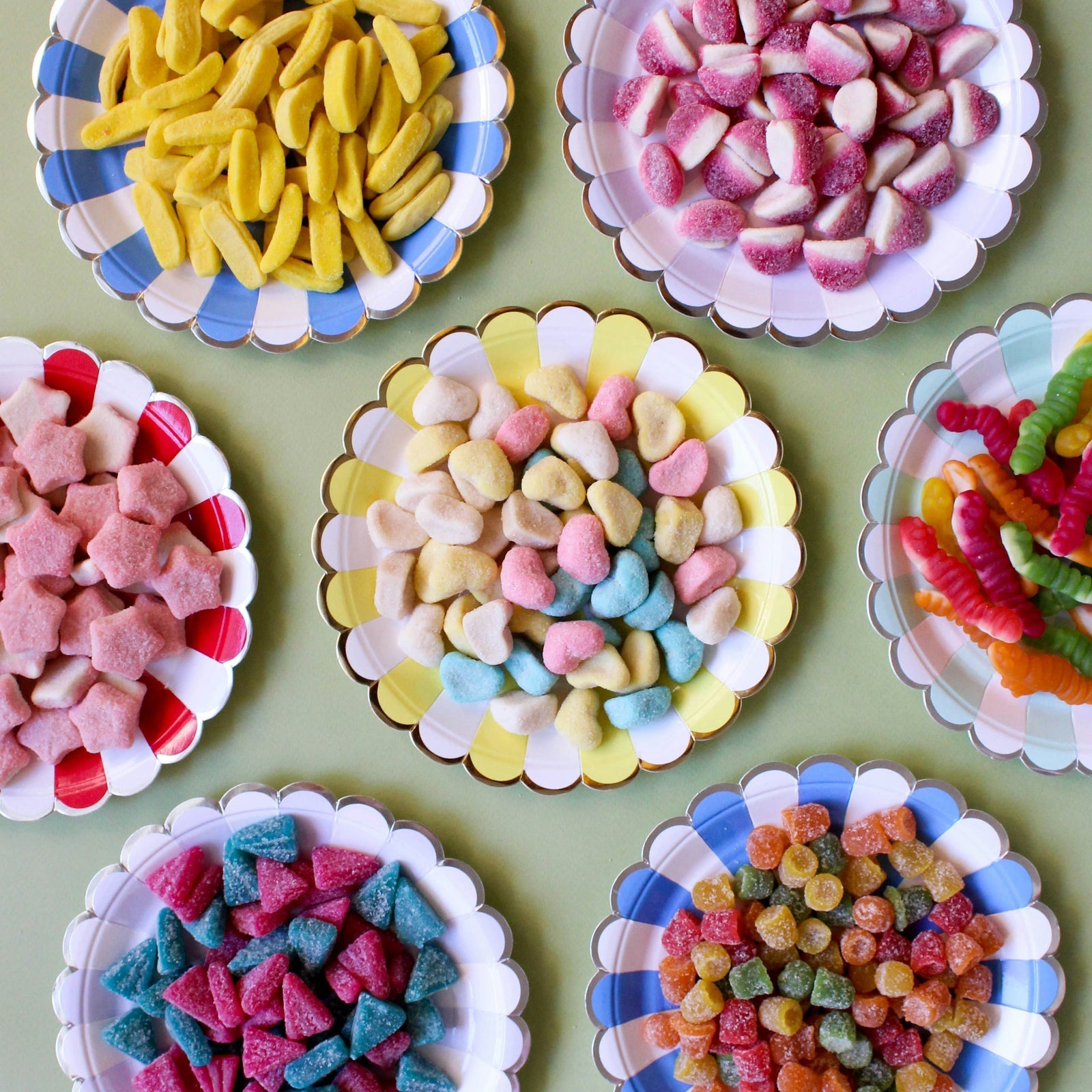 Sugar cubes stacked on a dark surface — sugar's detrimental effects on the human body
